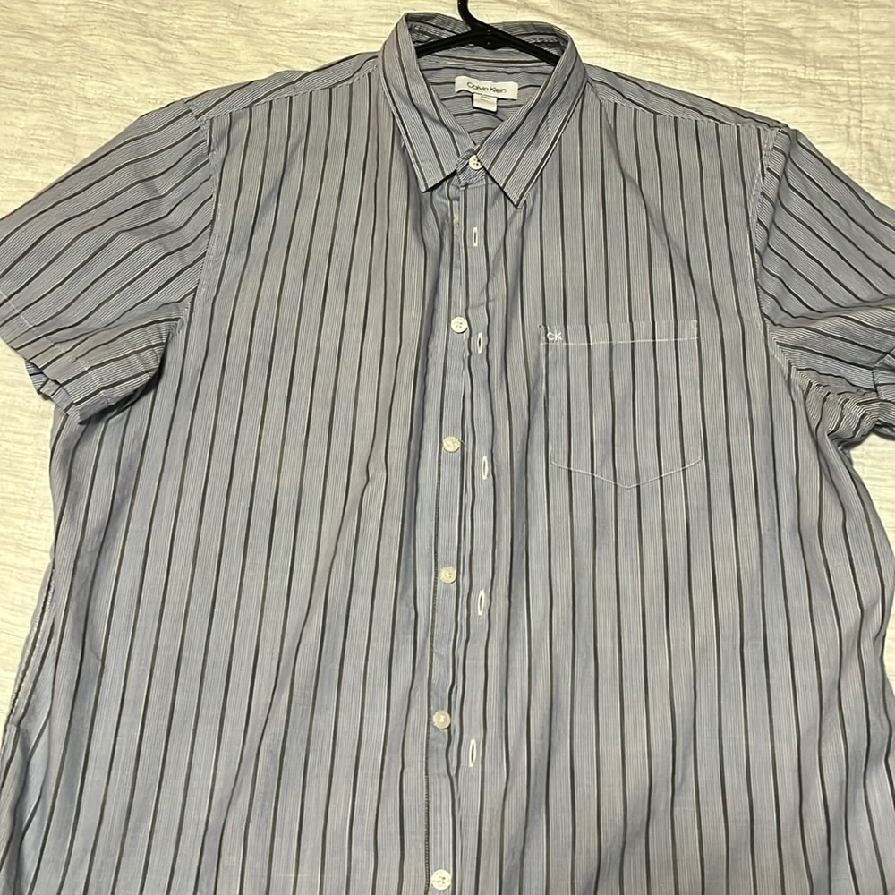 Light blue pin stripped button up t-shirt